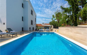 Awesome apartment in Malinska with Outdoor swimming pool, WiFi and 2 Bedrooms